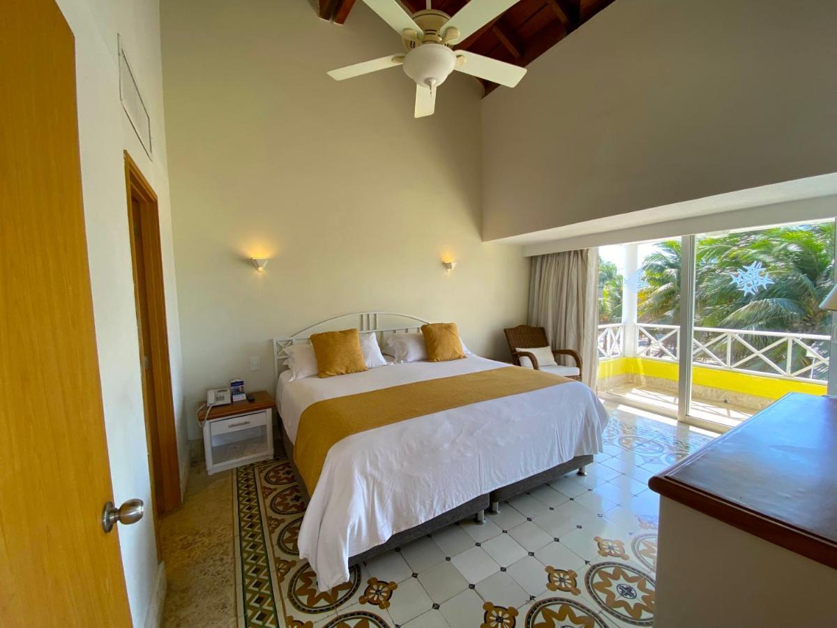 فندق لاس أميريكاس كاسا دي بلايا Cartagena المظهر الخارجي الصورة A bedroom at the hotel